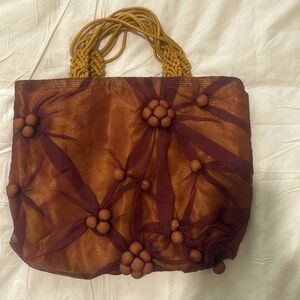 Dramatic Fabric Purse in Orange & Purple